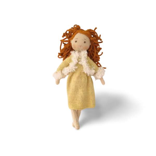Sunny Mae has reddish hair and waers a yellow dress to impress. Her finishing touches is impressive and she will make a little girl's heart melt.